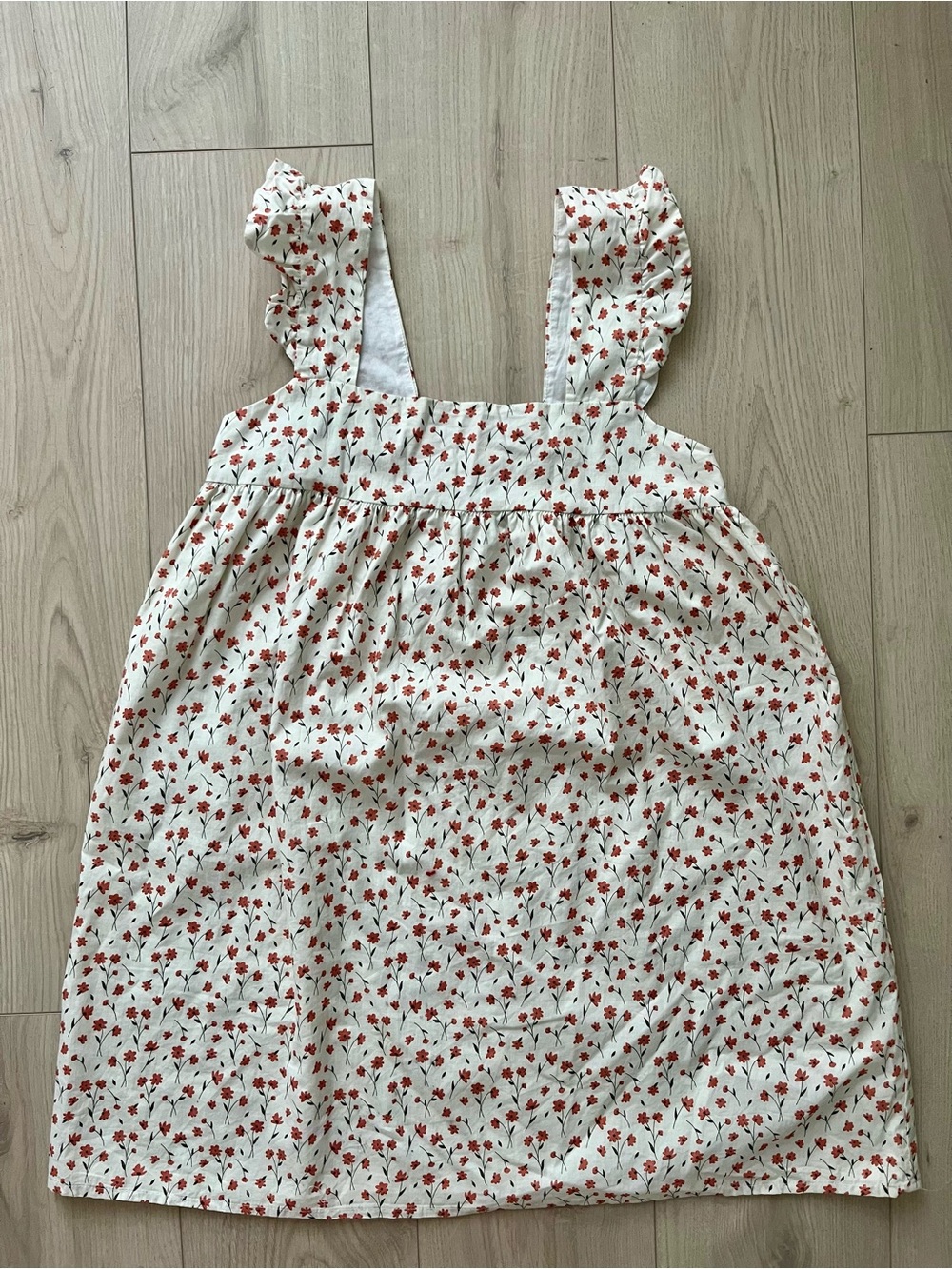 Essentials White Baggy Dress with Soft Pink Floral Motif